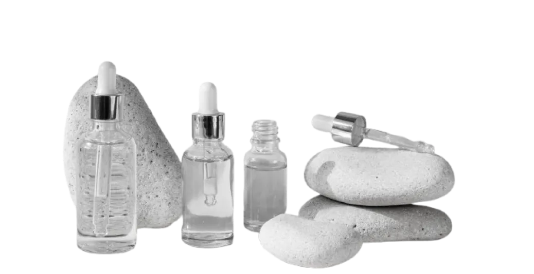 Skincare bottles and stones
